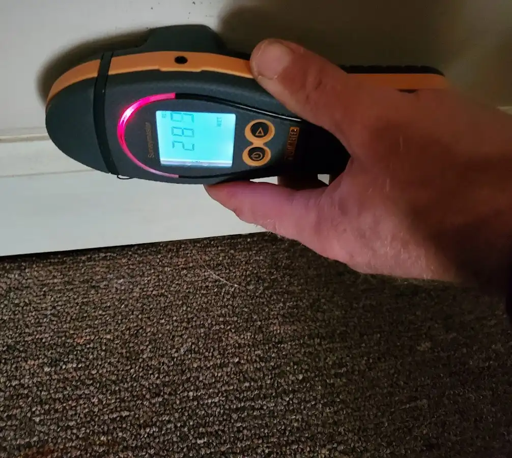 Moisture detection at baseboard during Storm Damage Restoration in Castro Valley